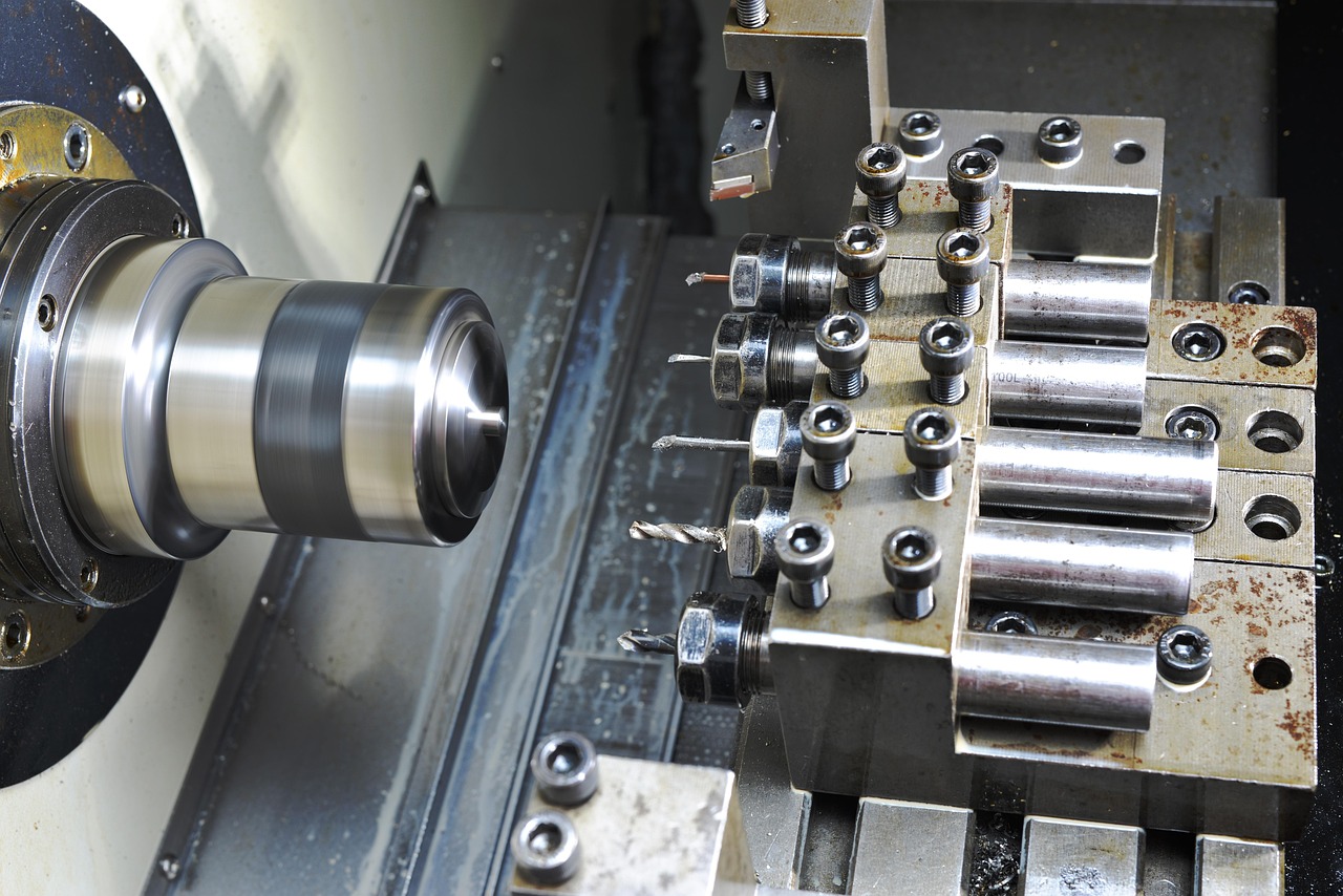 CNC milling machine cutting aluminum part with coolant